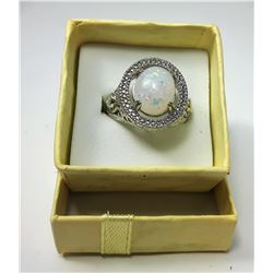 17 - WHITE ROUND FIRE OPAL RING