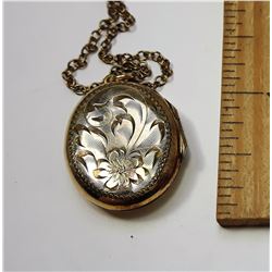 12 - VINTAGE OVAL GOLD FILLED LOCKET