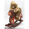 Image 1 : ANCIENT MAN RIDING ROCKING LION FIGURINE