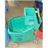 Image 1 : GREEN MOP BUCKET WITH WRINGER
