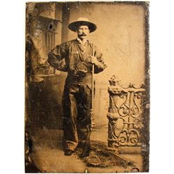 Tintype of a Cowboy and His Rifle