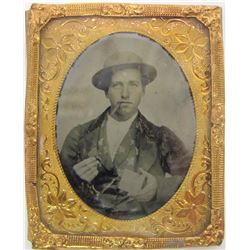 Tintype of Miner Holding Two Ingots