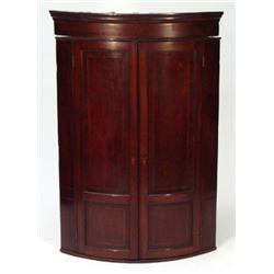 George III inlaid mahogany bow fronted hang…