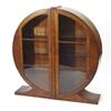 Image 1 : Circular mahogany Art Deco china cabinet, f…