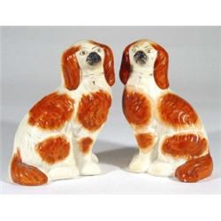 Pair of Victorian seated Staffordshire span…