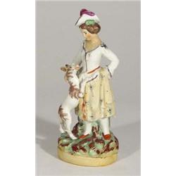 Hand painted Staffordshire figure of a youn…