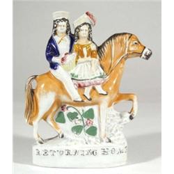 Victorian Staffordshire figure group 'Retur…