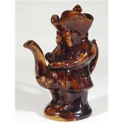 Victorian treacle glazed pottery Toby jug w…