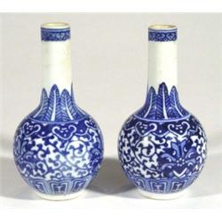 Pair of Chinese porcelain bottle vases, han…