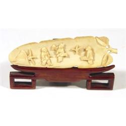 Japanese ivory leaf carved with figures on …
