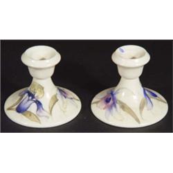 Pair of Moorcroft pottery candlesticks, han…
