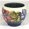 Image 1 : Moorcroft pottery vase, hand painted and gi…