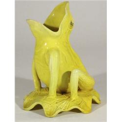 Yellow glazed Burmantofts style seated frog…