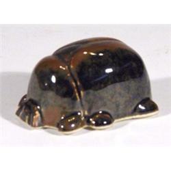 Arabia brown glazed scarab beetle, raised m…