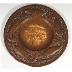 Circular Newlyn copper charger, embossed wi…