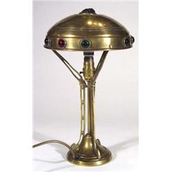 Brass Arts and Crafts table lamp, the domed…