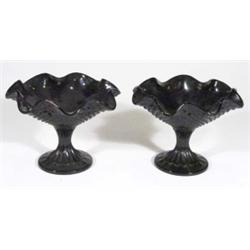 Pair of Victorian black pressed glass sunda…