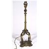 Image 1 : Brass table lamp on four scrolled supports,…