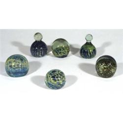 Four globular Medina glass paperweights and…