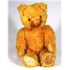 Image 1 : Large straw filled jointed golden teddy bea…