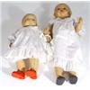Image 1 : Two composite headed dolls with open mouths…
