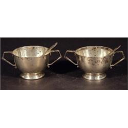 Two silver twin handled trophy shaped salts…