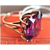Image 1 : Emerad Cut Synthetic Amethyst 9 ct (16.5 x 13.3 x 6.5mm), Unmarked Yellow Gold, Tested 10K (nicks an