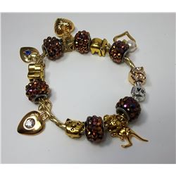 19 - GOLD TONE PANDORA STYLE