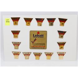 SHEET OF 15 CWG LABATT PROUD SPONSOR PINS