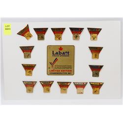 SHEET OF 15 CWG LABATT PROUD SPONSOR PINS