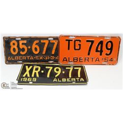 THREE VINTAGE AUTO ALBERTA LICENSE PLATES.