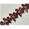 Image 2 : 32) STERLING SILVER GARNET FLOWER SHAPED BRACELET