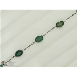 48) 14K WHITE GOLD 9 EMERALD BRACELET