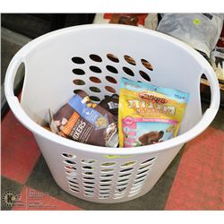 LAUNDRY HAMPER FILLED WITH ASSORTED DOG TREATS