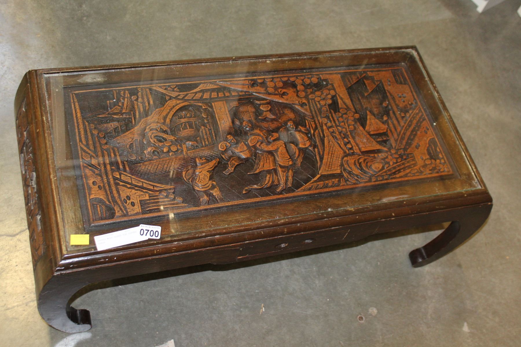 CARVED WOOD GLASS TOP COFFEE TABLE