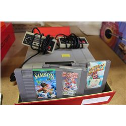 ORIGINAL NES SYSTEM TWO CONTROLLERS AND 3 REPRODUCTION GAMES