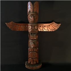 H.W. AMOS, HAND CARVED 4 FIGURE TOTEM POLE, FEATURING EAGLE, MAN, BEAR, AND CHILD DESIGNS,