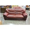 Image 1 : BURGUNDY LEATHER SOFA AND CHAIR