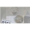 Image 1 : TWO 1963 CNADIAN DOLLAR COINS
