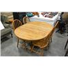 Image 1 : ROUND OAK DINING TABLE WITH FOUR HOOPBACK CHAIRS