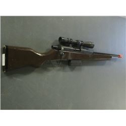 Kids play Rifle with scope / scope has cross hairs and the bolt action works