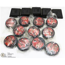 LOT OF 11 NEW COLLECTOR HOCKEY PUCKS.