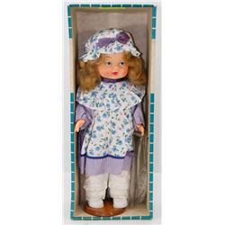PORCELAIN DOLL MADE BY RELIABLE TOYSCOMPANY