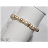 Image 2 : 30) FRESHWATER PEACH PEARL FLEXIBLE BRACELET