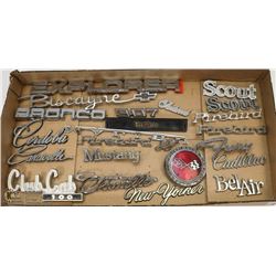 FLAT OF ASSORTED VEHICLE BADGES