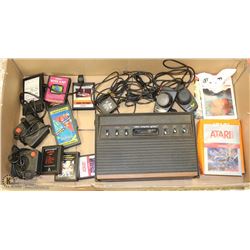 ATARI 2600 WITH GAMES AND CONTROLLERS