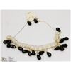 Image 1 : BLACK AND WHITE BEADED NECKLACE AND EARRING SET