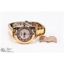 21) BULOVA DIAMOND MOTHER OF PEARL DIAL STAINLESS