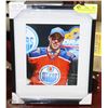 Image 1 : FRAMED MCDAVID DRAFT PHOTO.
