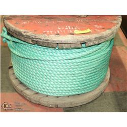 LARGE SPOOL OF NEW GREEN HEAVY DUTY ROPE.